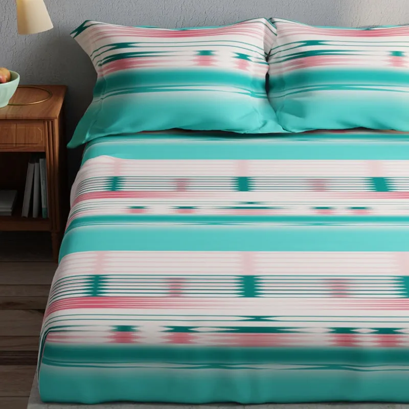 Close view of sea green bedsheet and pillow covers with abstract striped pattern