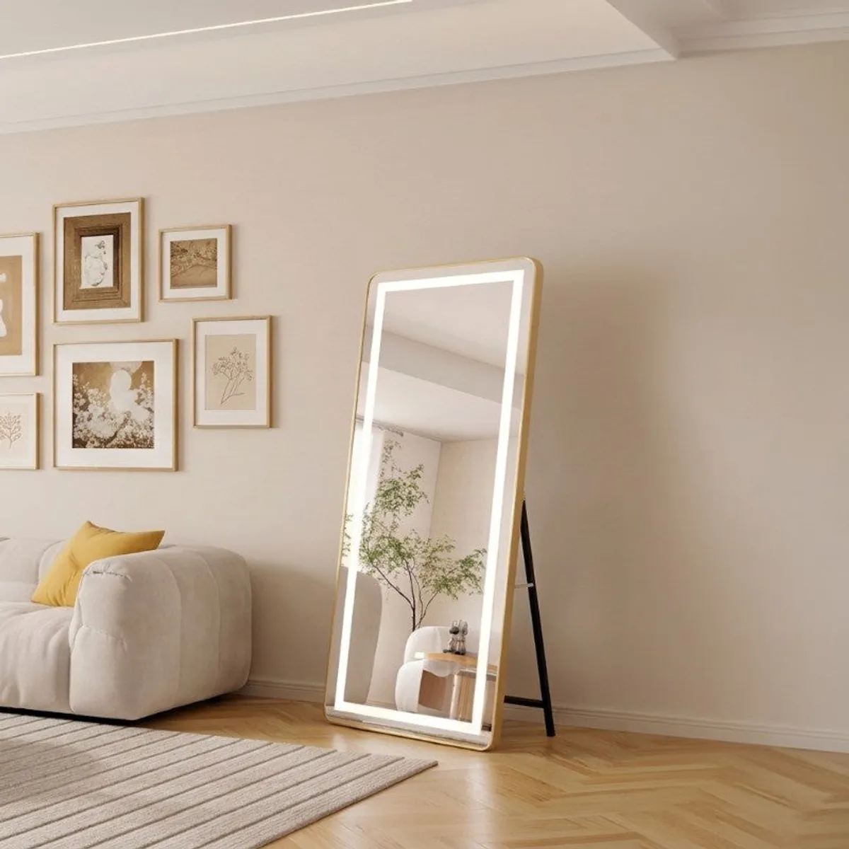 LED floor mirror leaning on a stand beside a cream sofa