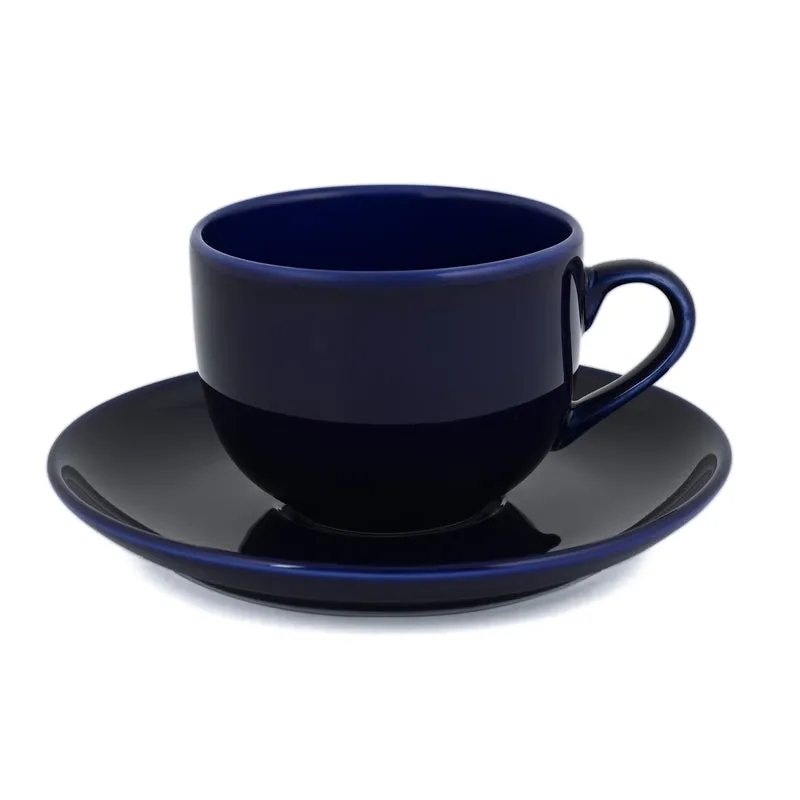 Glossy blue cup resting on a matching saucer