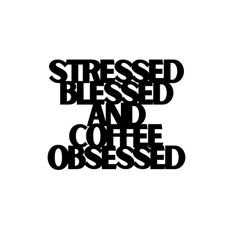 Black typographic wall accent displayed against a plain white background