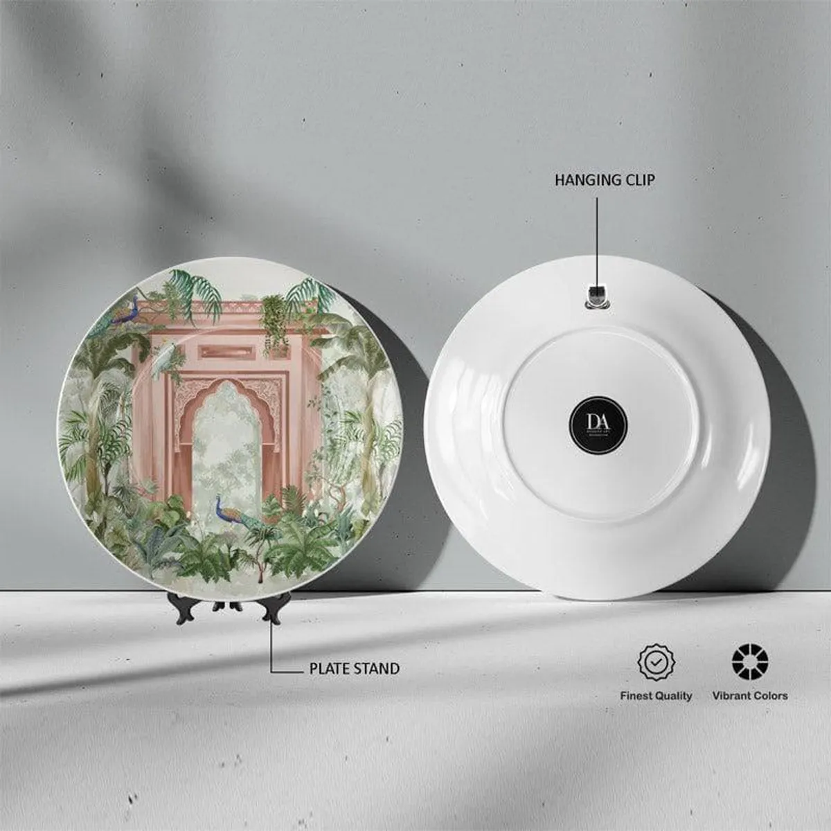 Front and back view of round wall plate with hanging clip