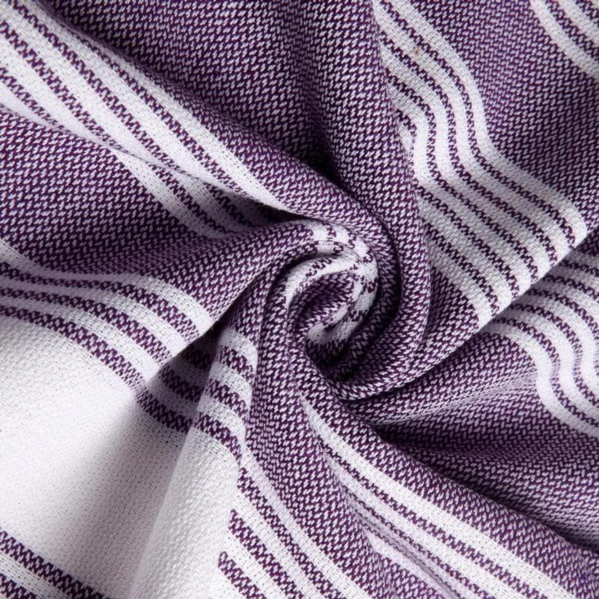 Close-up of purple and white woven striped towel fabric
