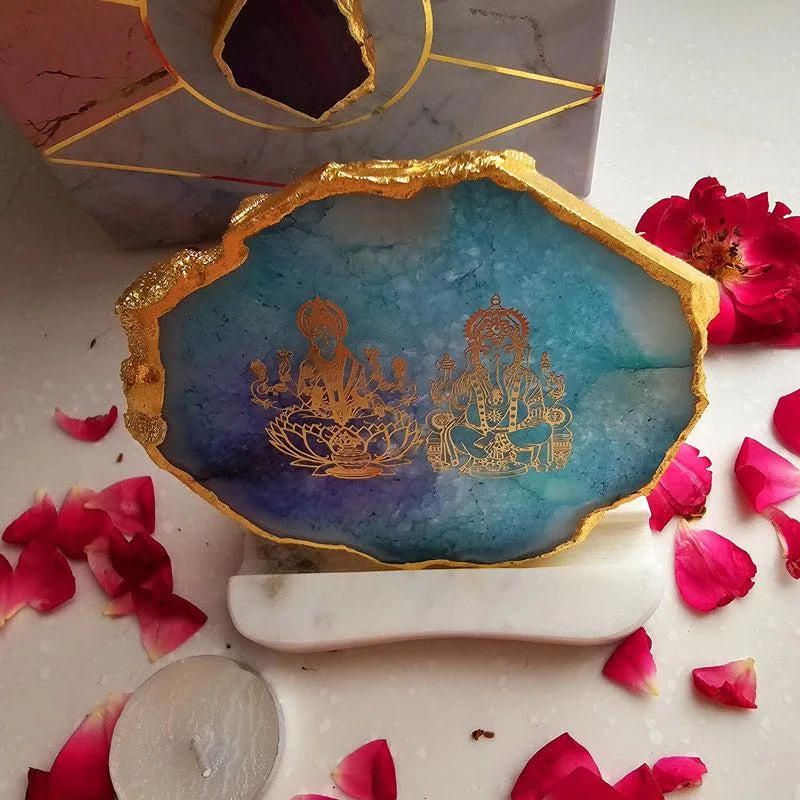 Blue agate candle holder with gold deity artwork and white base