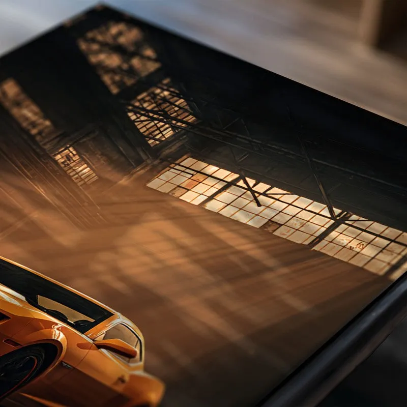 Close-up of a vintage car poster showing warm industrial lighting scene