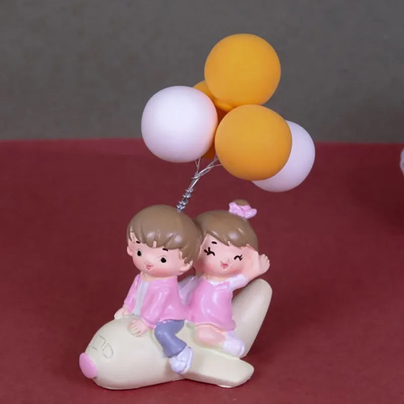 Young Love In Air Resin Showpiece - Yellow media 4
