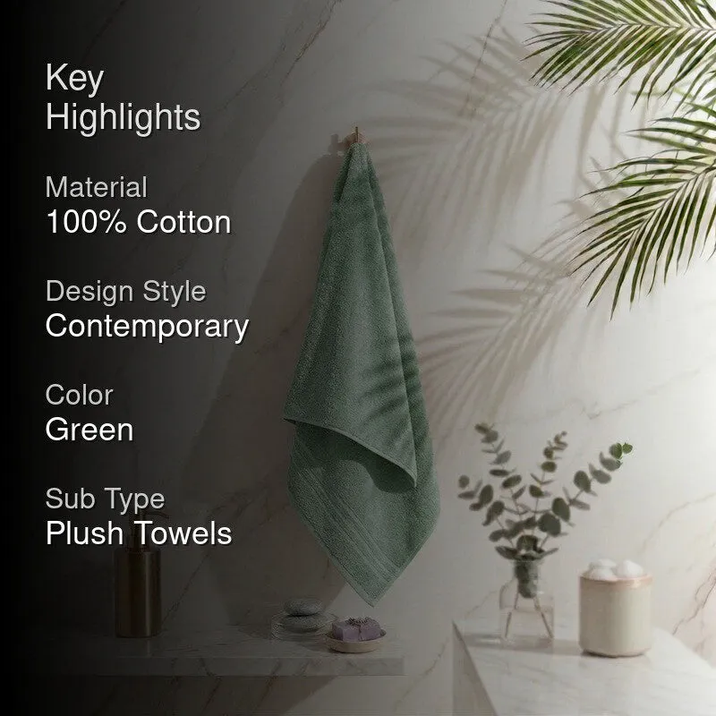 Sage green bath towel hanging with highlight text overlay
