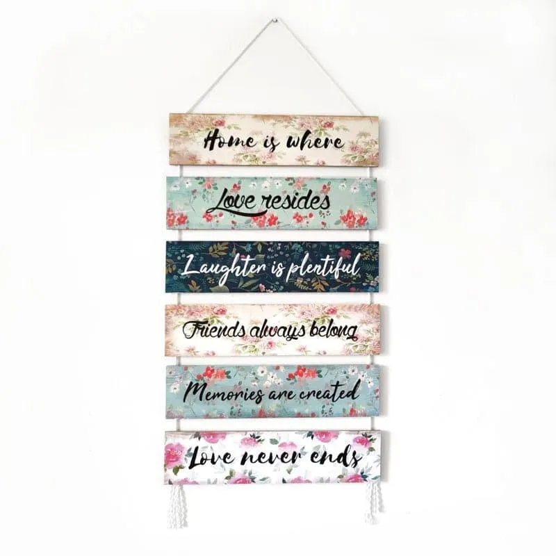 Front view of a multicolour floral wall hanging with six horizontal message slats