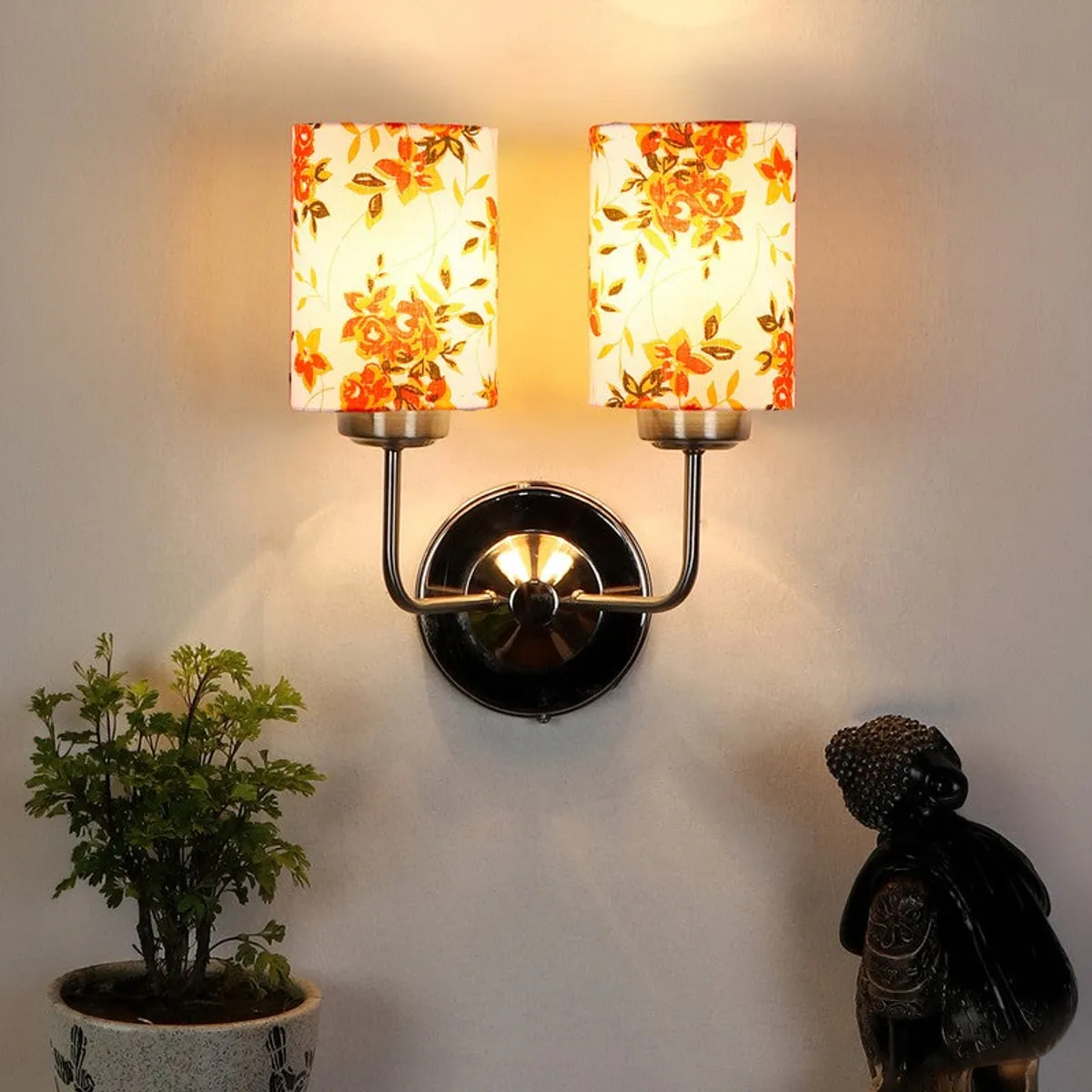 Lit floral cotton wall lamp mounted on a wall