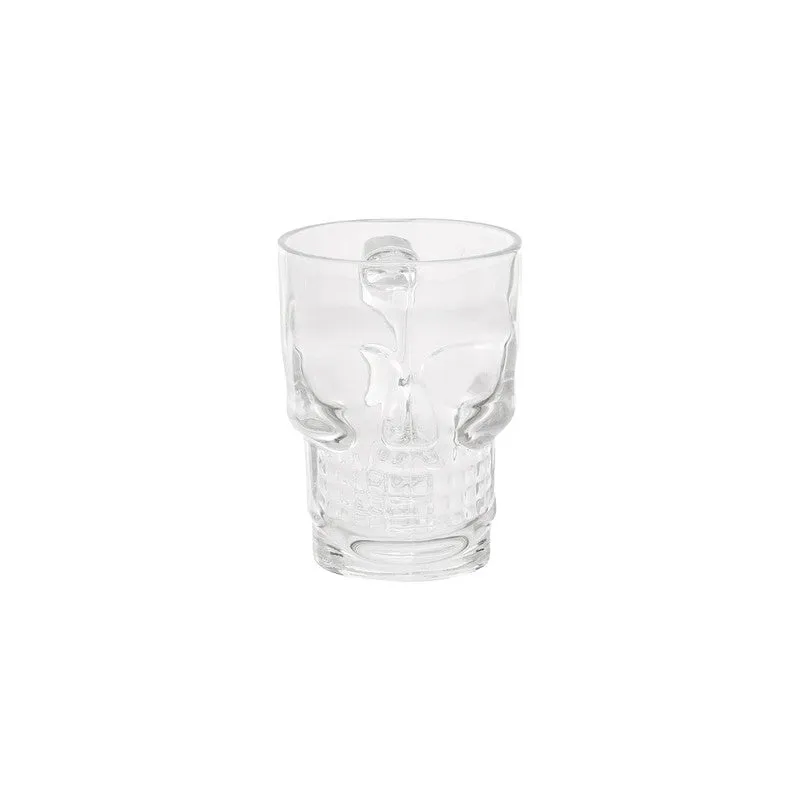 Tall clear glass with a skull face moulded into the front