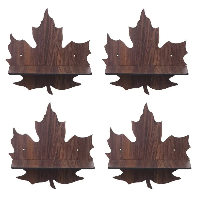 Four brown leaf-shaped wooden wall accent shelves on a white background