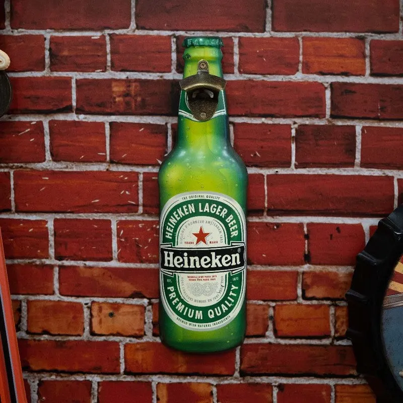 Full view of Heineken bottle-shaped wall opener against a brick wall