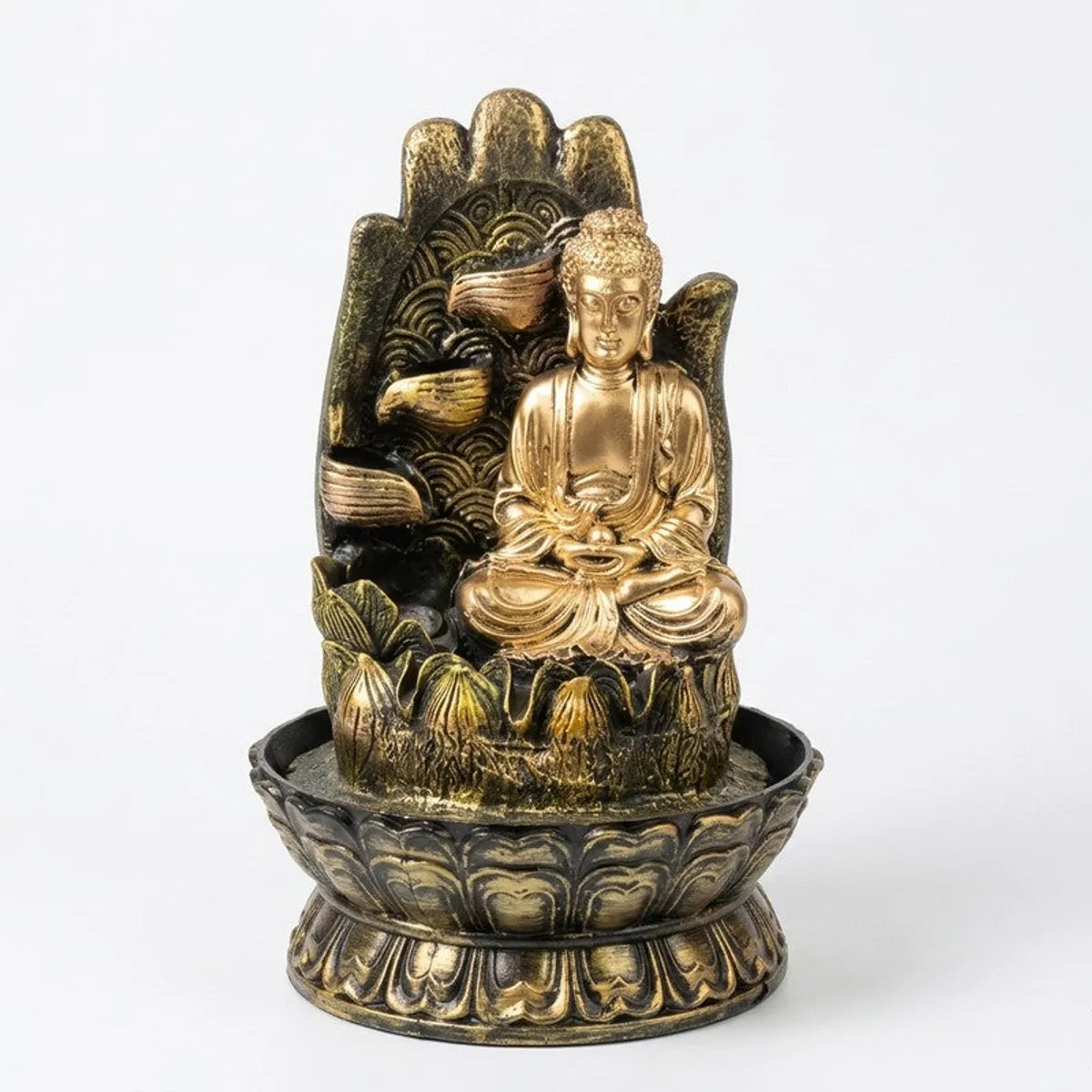Front view of metallic gold Buddha fountain showpiece on a plain background