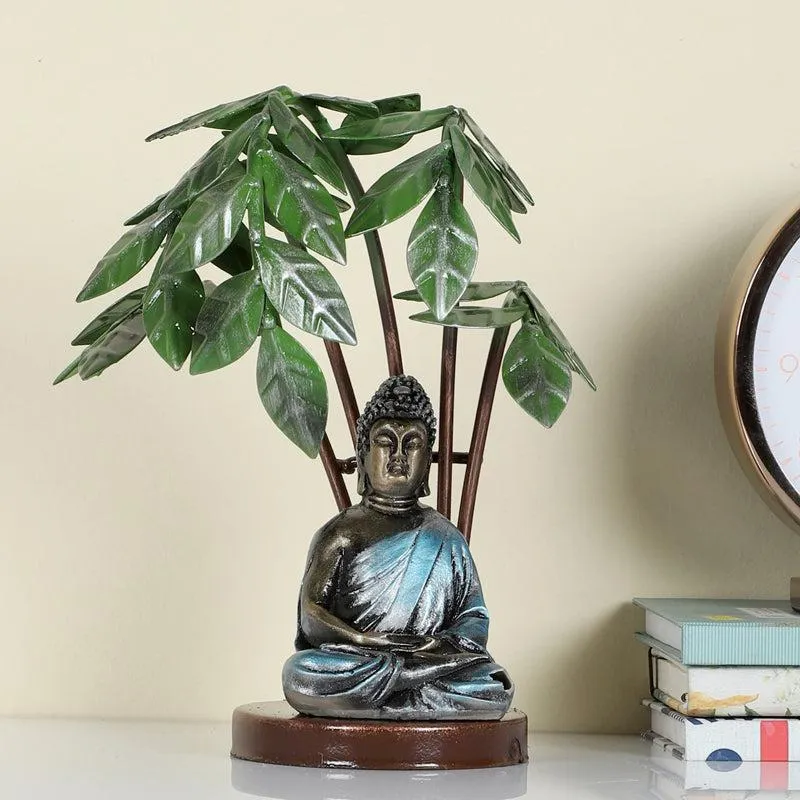 Full view of Buddha and Bodhi tree showpiece on a shelf