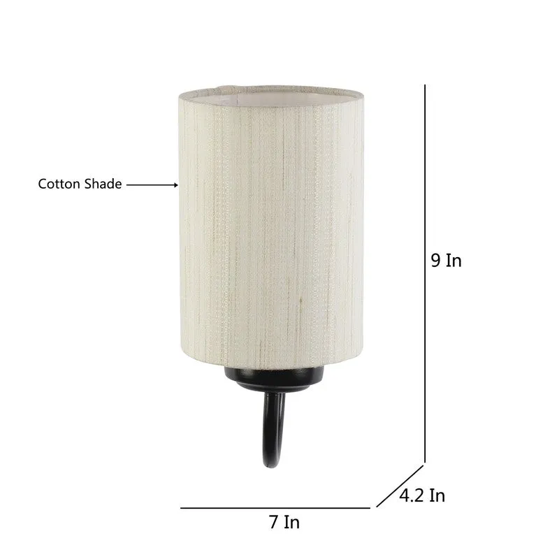 Beige cylindrical wall lamp with cotton shade and black base
