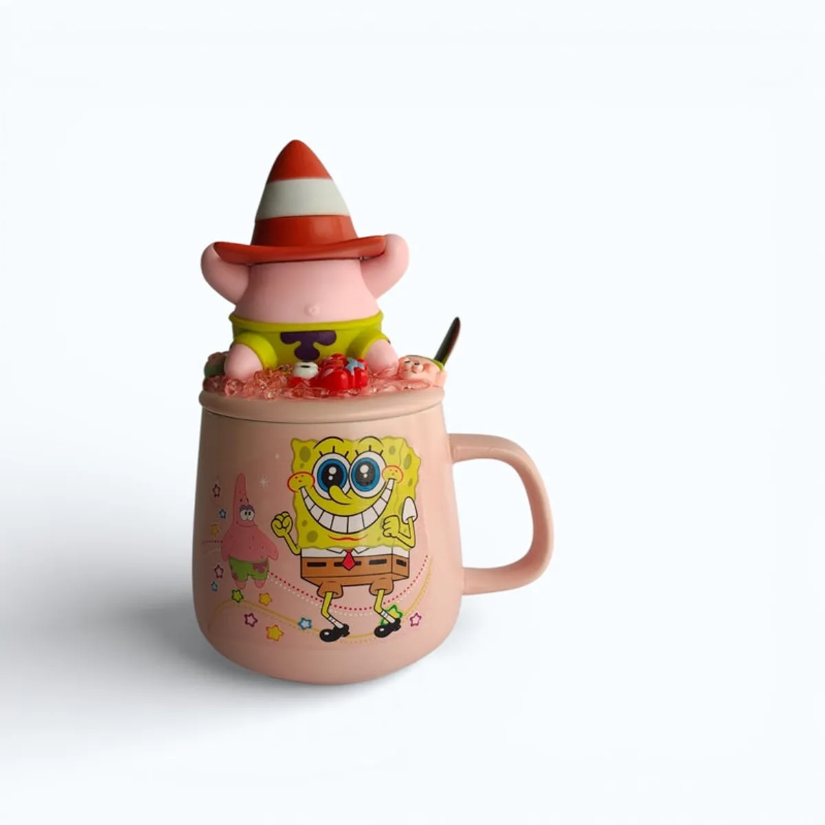 Pink ceramic cartoon mug with raised character lid on a white background