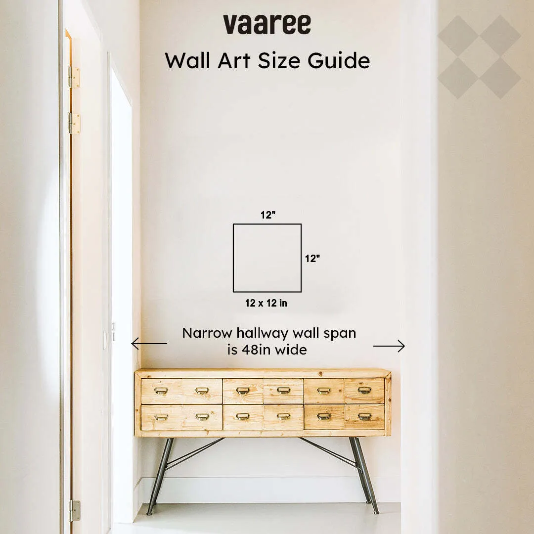 Wall art size guide graphic shown above a hallway console table.
