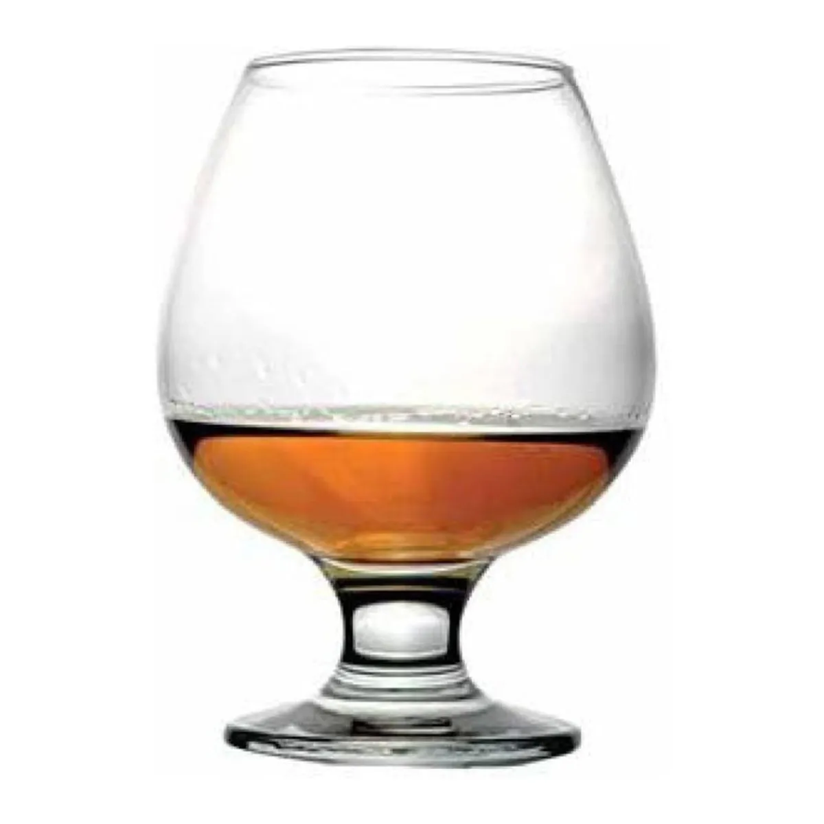 Clear rounded snifter-style glass with a small amount of amber liquid