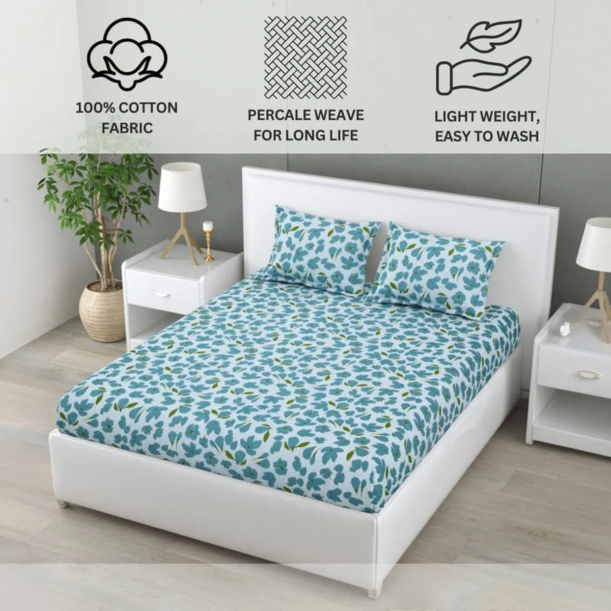 Blue floral bedsheet styled on a bed in a bright bedroom setting