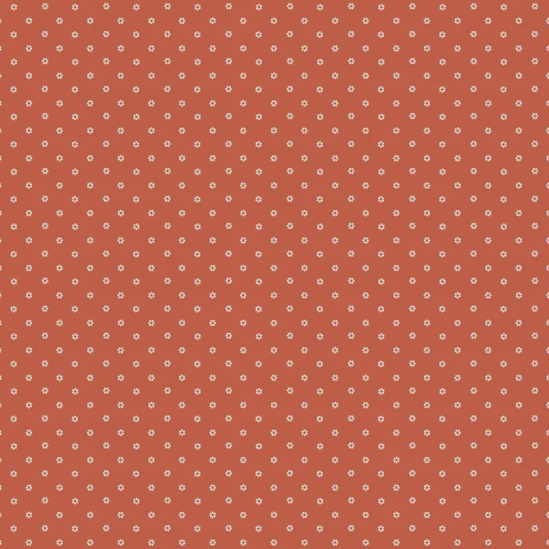 Detailed view of the rust curtain fabric with small repeating motifs