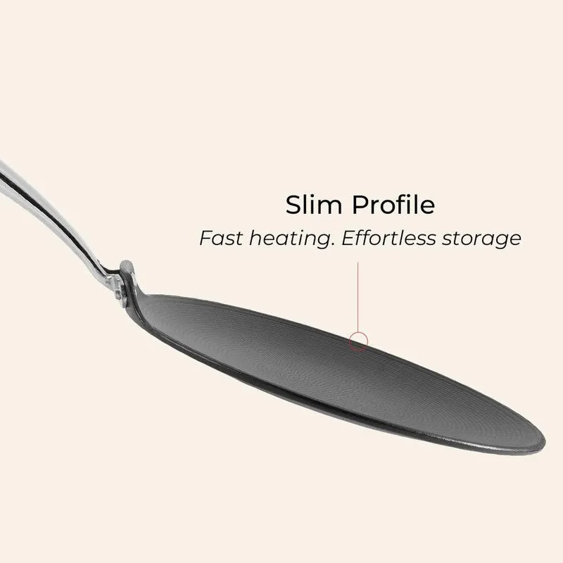 Side view showing the slim profile of the black roti tawa