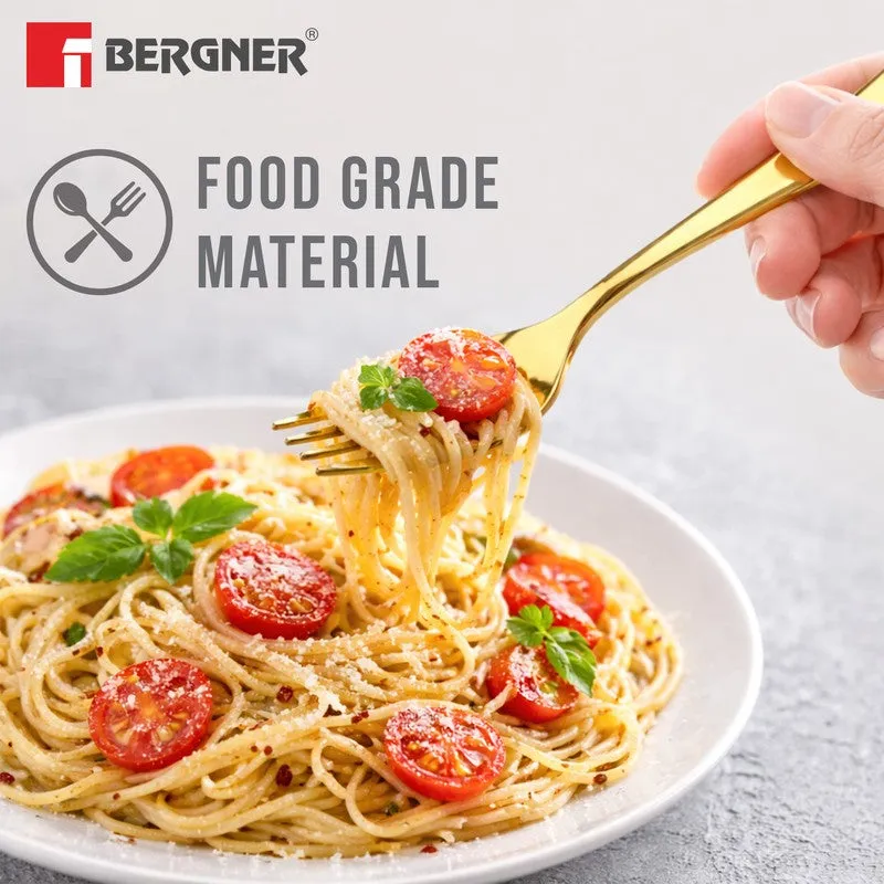 Hand holding a gold fork over a plate of pasta