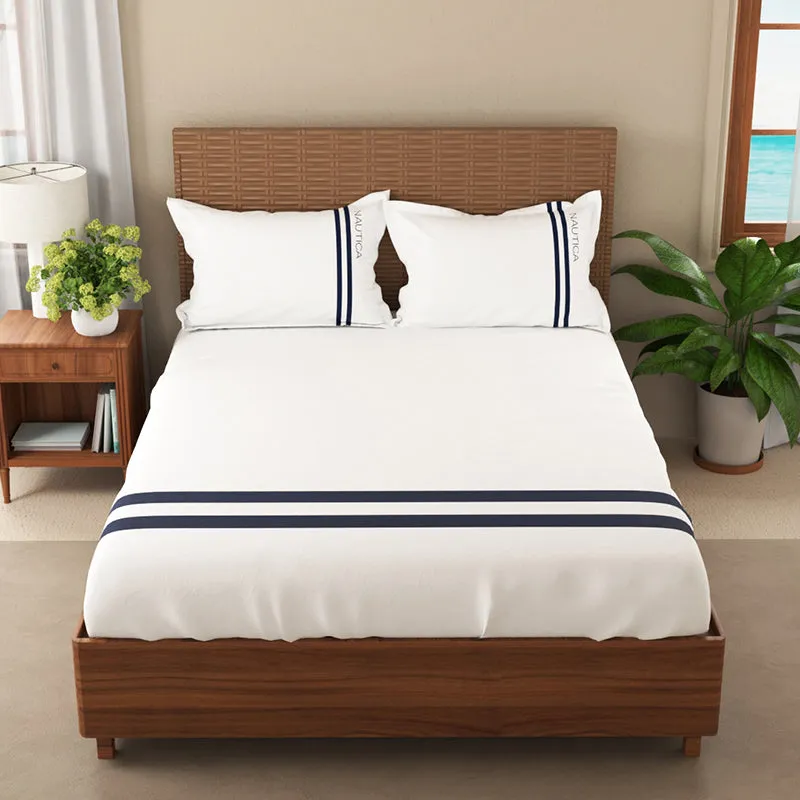 Front view of a white Queen fitted bedsheet with navy stripes and matching pillows.