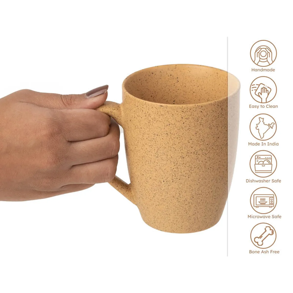 Close-up of a mustard-yellow ceramic mug held by its handle
