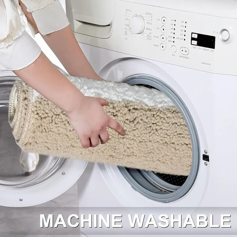 Rolled beige and white bath mat being placed into a washing machine
