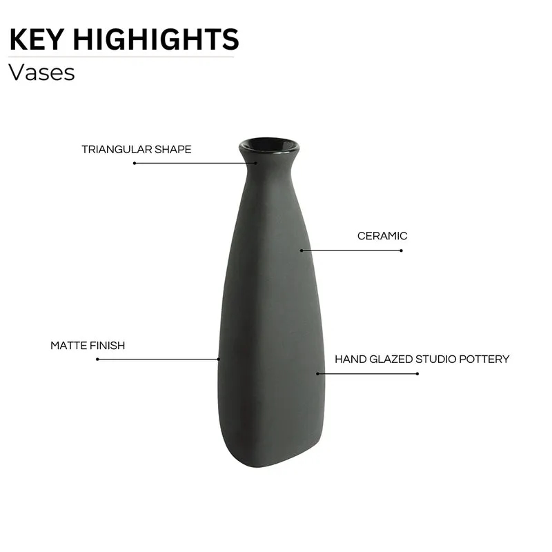 Single black tapered vase on a white background
