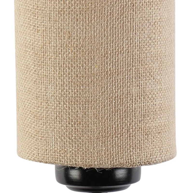 Close-up of woven jute shade and black iron base detail