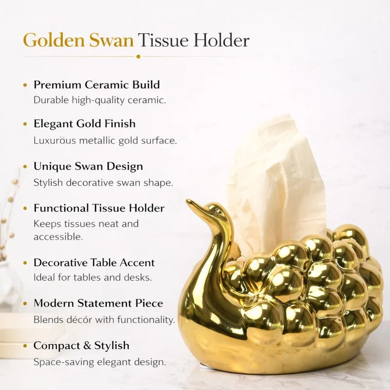 Gold ceramic swan tissue holder with a tissue in a bright interior