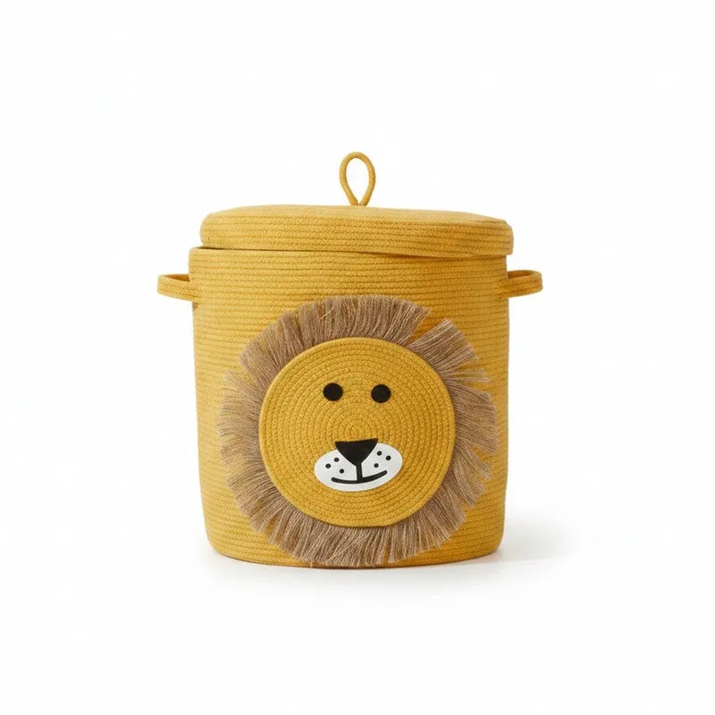 Front view of yellow cylindrical storage basket with lid and lion face detail