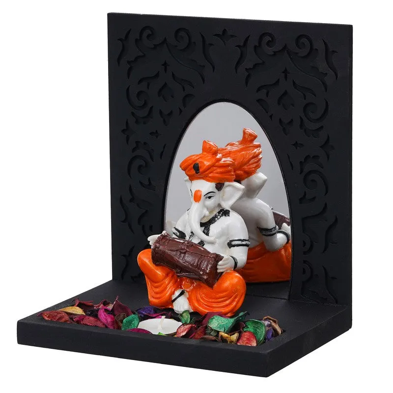 Side angle of rectangular black tea light holder with Ganesha figurine