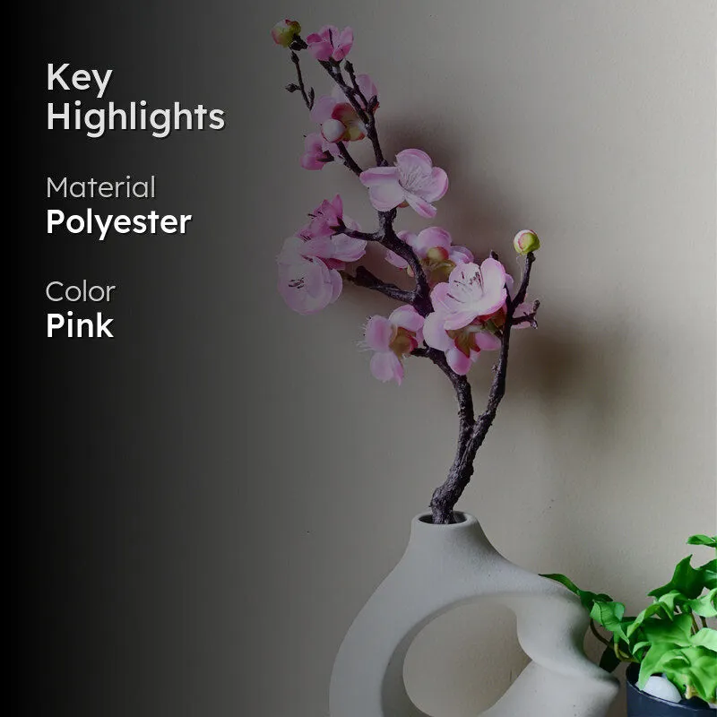 Pink artificial plum blossom stick in a vase with key highlights
