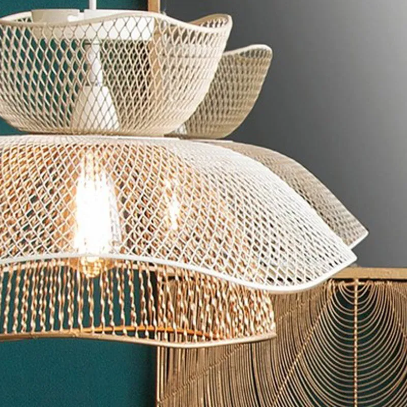Side close-up of the layered mesh metal shade in gold and white