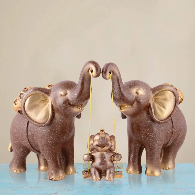 Tiny Tuskers Painted Polyresin Show Piece - Brown media 1