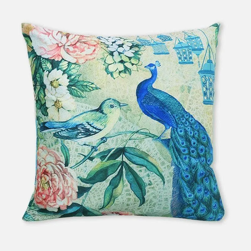 Square cushion cover with peacock, bird and floral print in blue and pastel tones