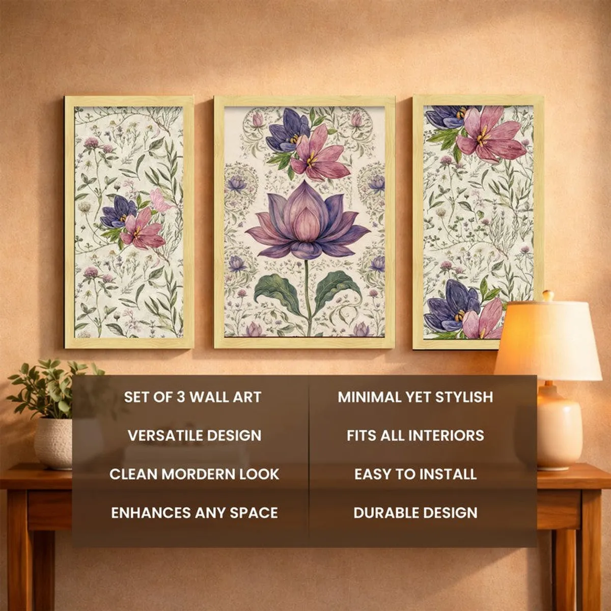 Three framed botanical floral artworks above a wooden console with a lamp and plant.