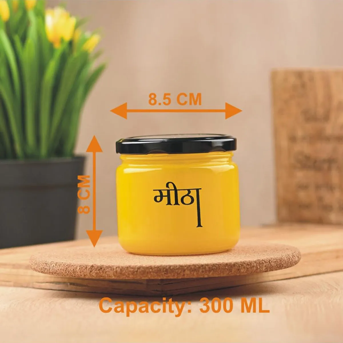 Yellow jar with black lid shown with visible size and capacity graphics