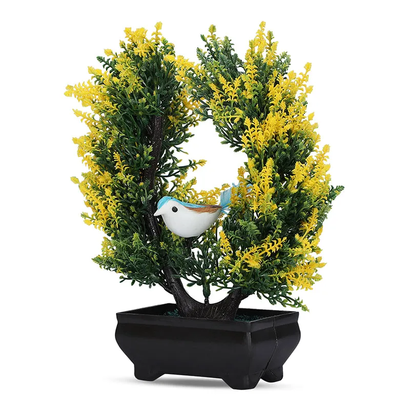 Full artificial plant with yellow-green foliage, bird detail and black pot