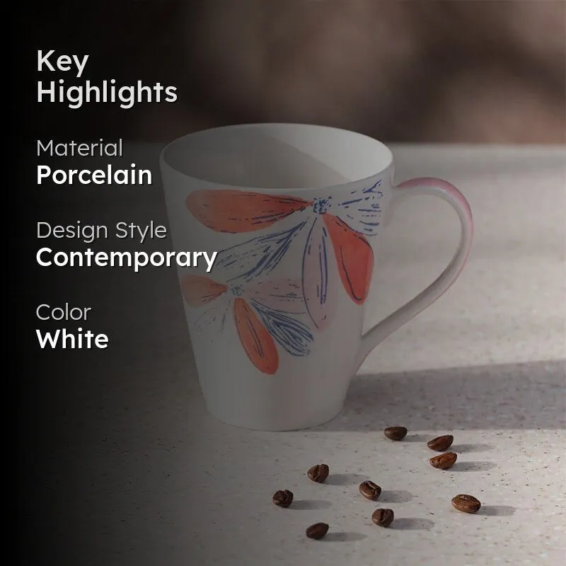 White floral porcelain mug shown in a styled coffee setting