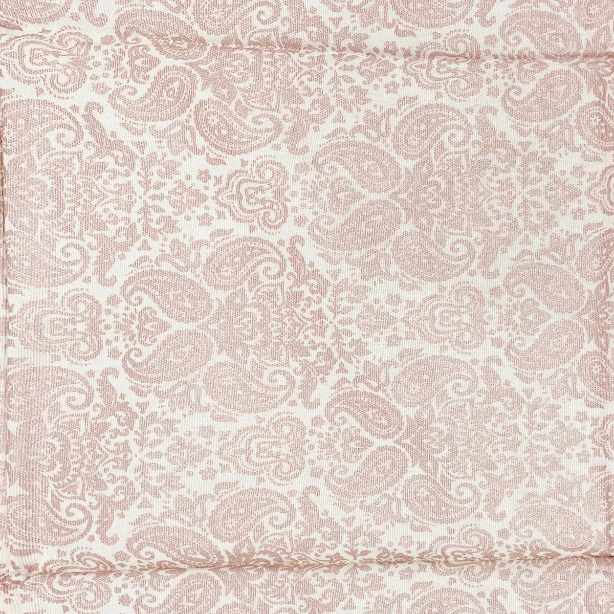 Close-up of beige paisley-style print on the basket fabric