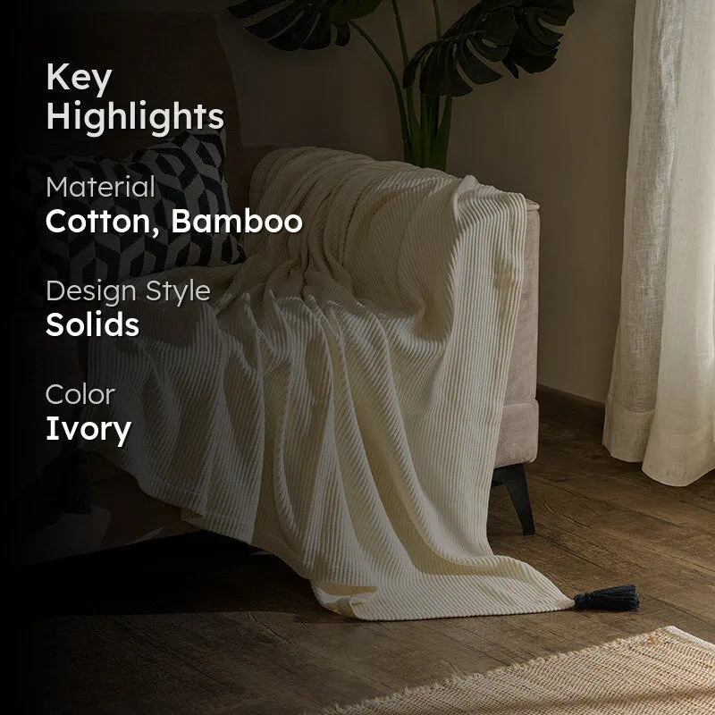Nestlin Tassled Throw - Ivory & Black media 2