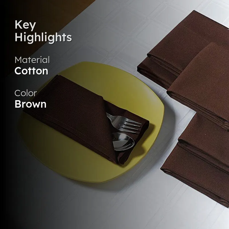 Brown table napkins arranged on a dining table