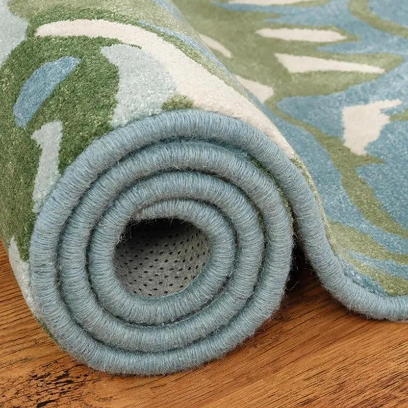 Rolled carpet showing thickness, edge binding and backing