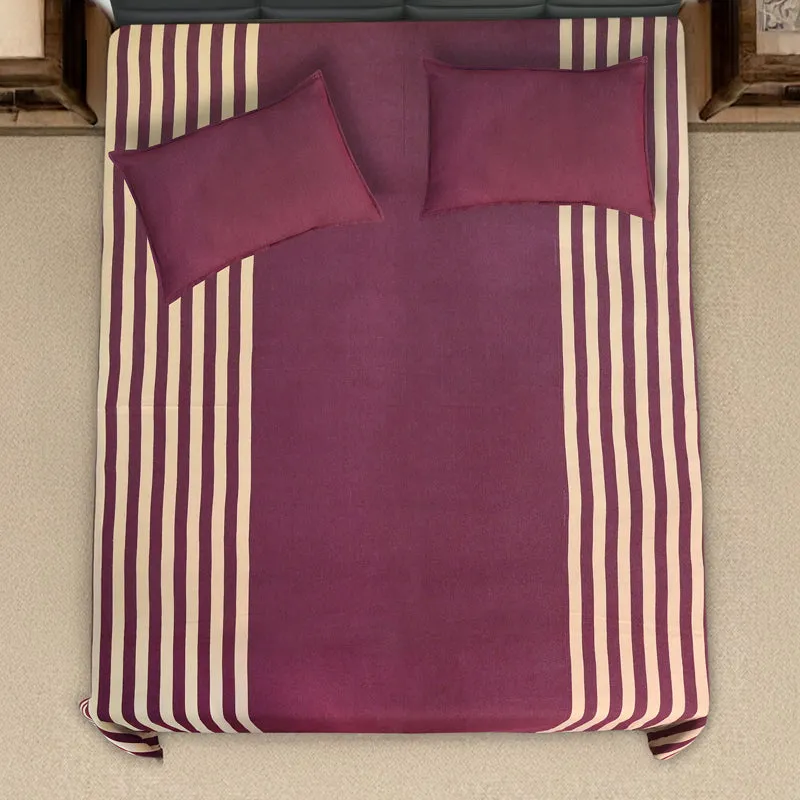 Top view of maroon bedsheet with beige stripes and two pillow covers