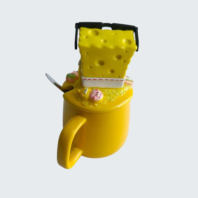 Back view of yellow SpongeBob mug with character figurine lid