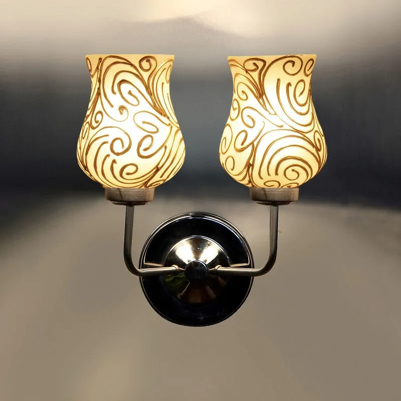 Dual wall lamp with glowing glass shades and upward light effect
