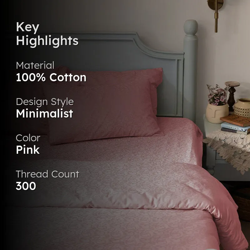 Pink duvet cover styled on a bed with key highlights overlay