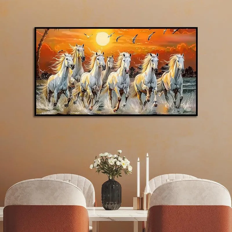 Rectangular wall painting of white horses under an orange sunset above a dining setup